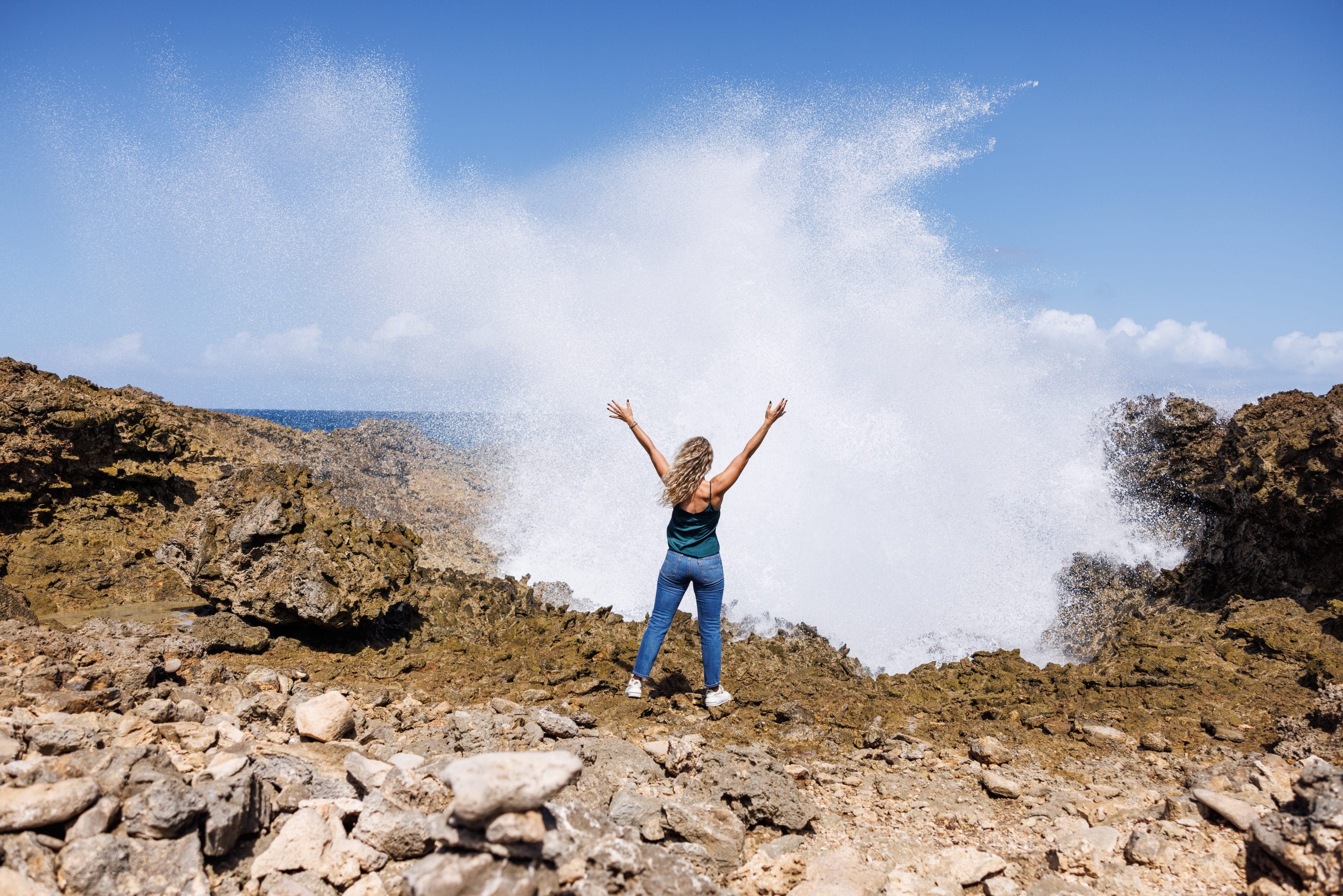 Hiker at the top of the mountain in Curacao